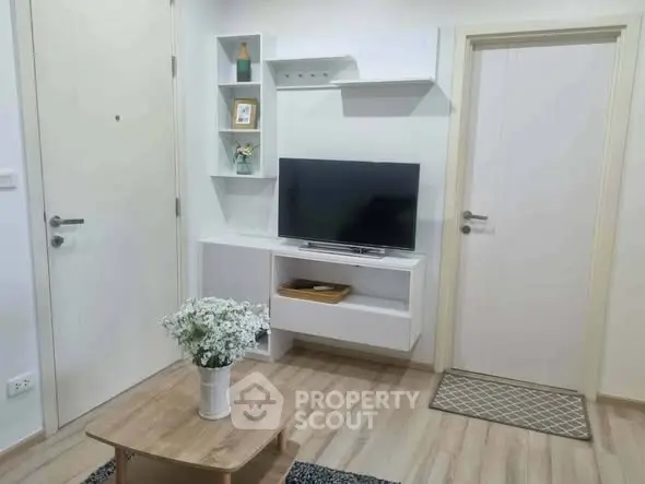 Modern living room with sleek TV unit and stylish decor