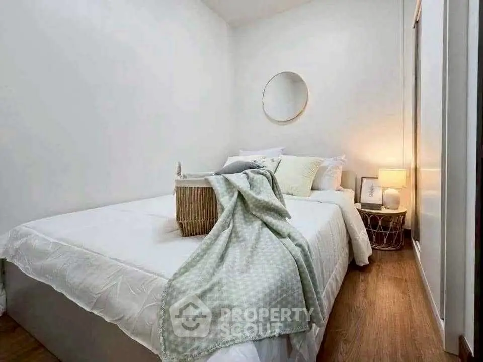 Cozy bedroom with modern decor and soft lighting