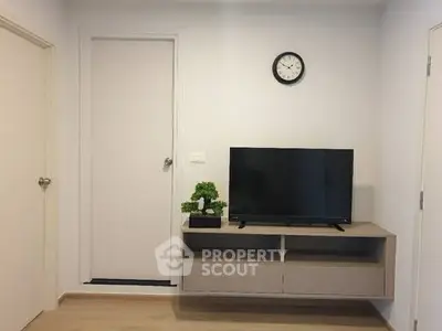 Modern living room with sleek TV stand and minimalist decor