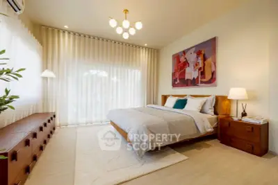 Elegant bedroom with modern decor, large window, and stylish lighting