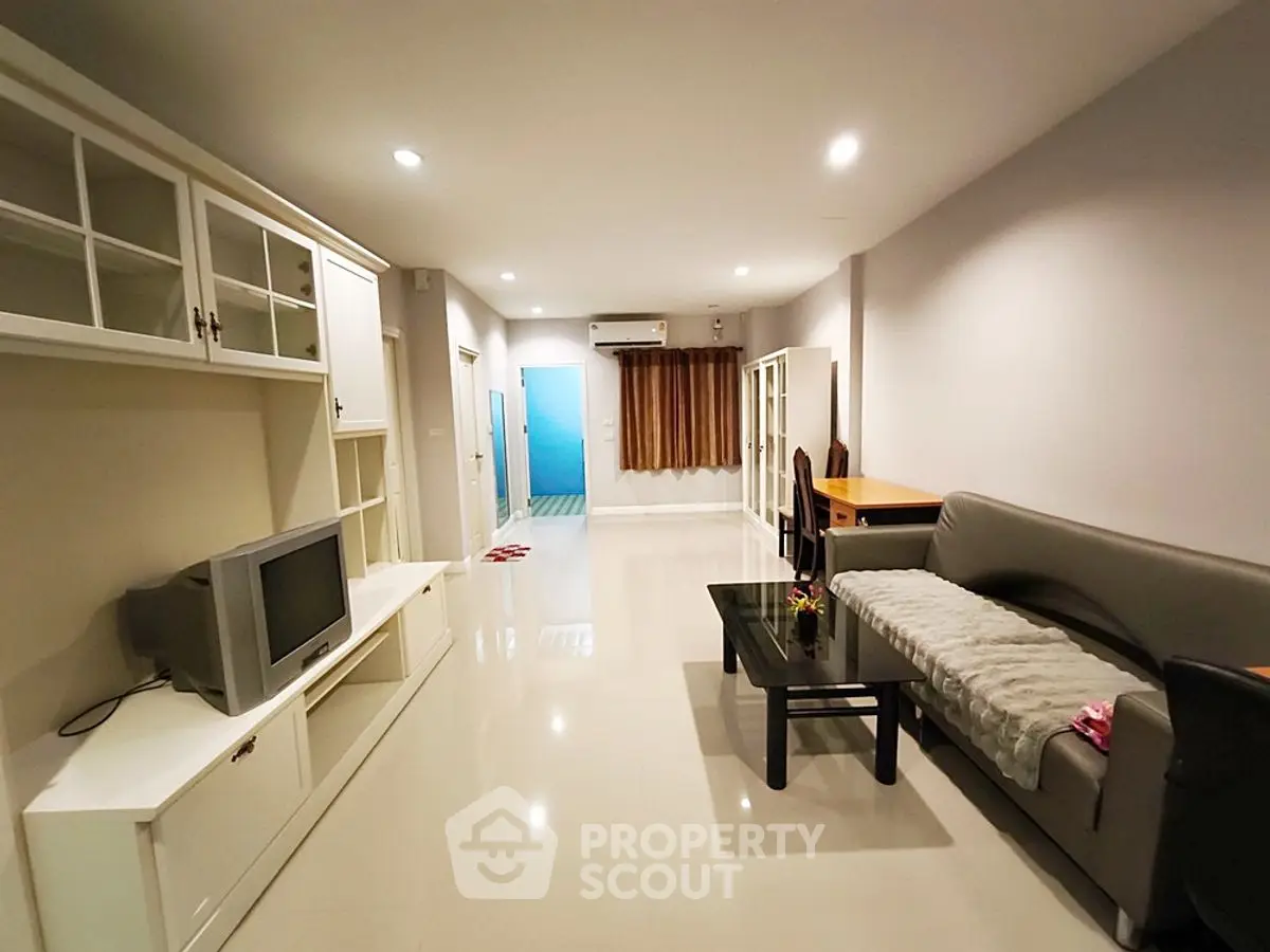 Spacious living room with modern furniture and sleek design