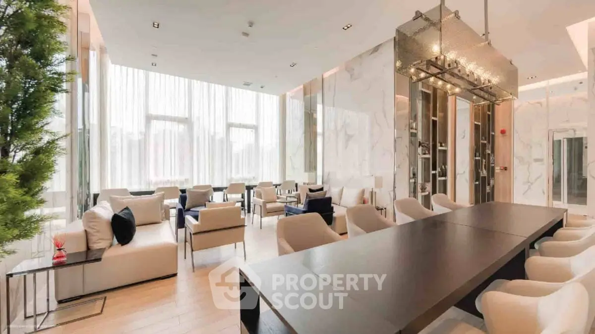 Luxurious modern living room with elegant decor and ample natural light