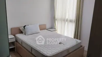 Cozy bedroom with natural light and minimalist decor