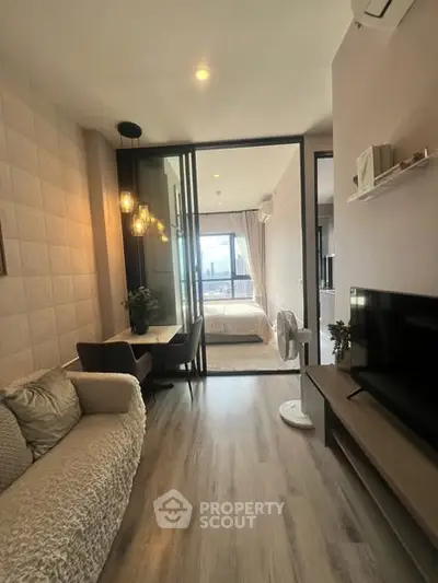 Modern apartment interior with cozy living room and stylish bedroom view.