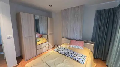 Cozy bedroom with modern wooden wardrobe and stylish decor