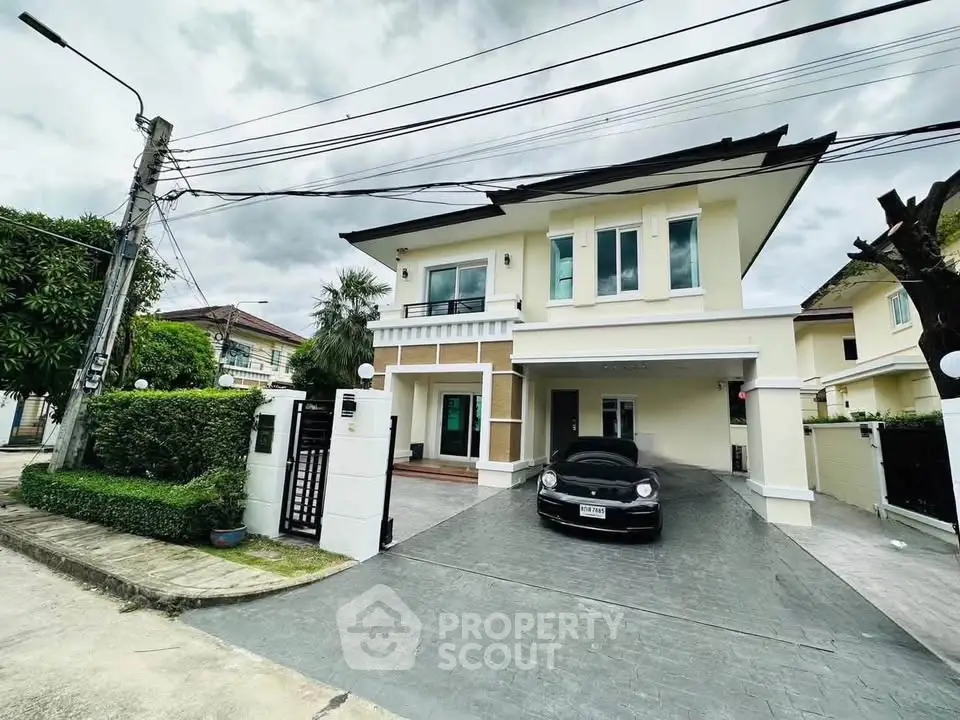 Elegant two-story house with modern design and spacious driveway