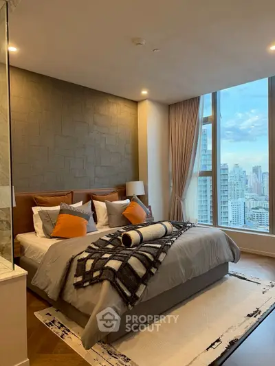 Luxurious bedroom with stunning city view and elegant decor