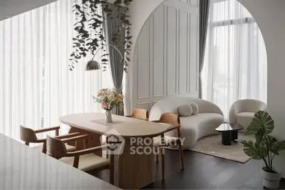 Elegant modern living room with stylish furniture and large windows, perfect for urban living.