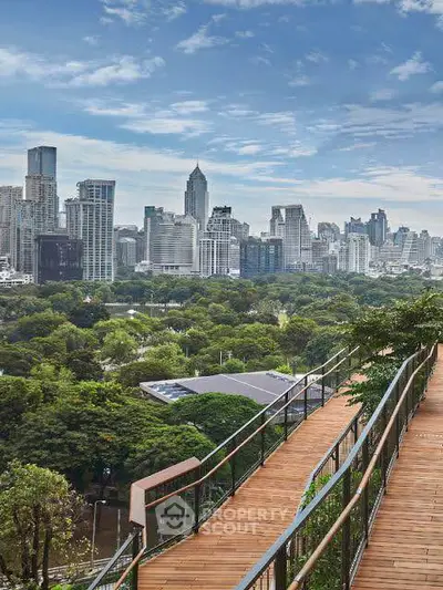 Stunning cityscape view from a rooftop garden with lush greenery and modern skyline.