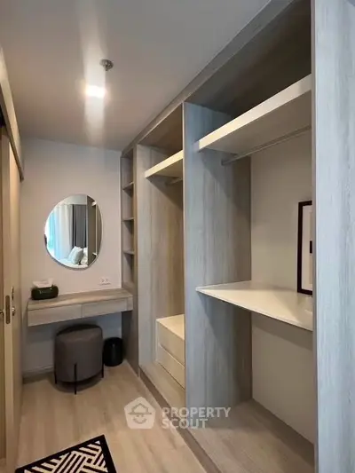 Spacious walk-in closet with modern design and ample storage space