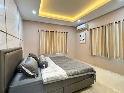 Luxurious bedroom with modern design and ambient lighting