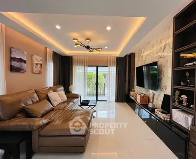 Luxurious living room with modern decor and large leather sofa