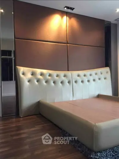 Luxurious bedroom with elegant tufted headboard and modern design