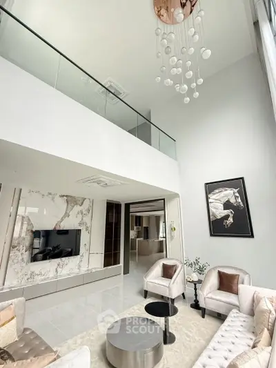 Luxurious modern living room with high ceiling and elegant decor