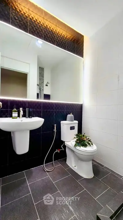 Modern bathroom with sleek design and elegant lighting