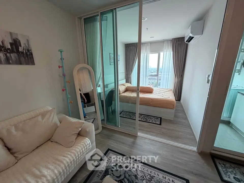 Modern apartment interior with cozy living room and bedroom, featuring stylish decor and natural light.