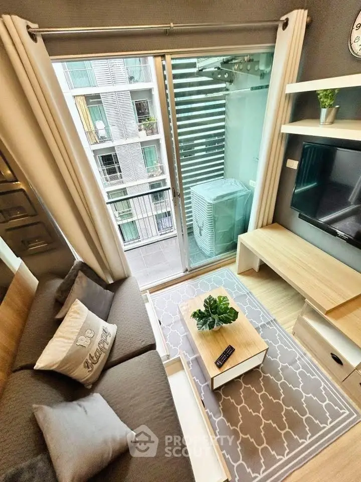 Modern living room with balcony view in stylish apartment