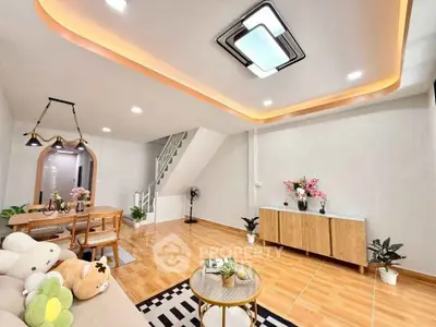 Modern living room with stylish lighting and cozy decor