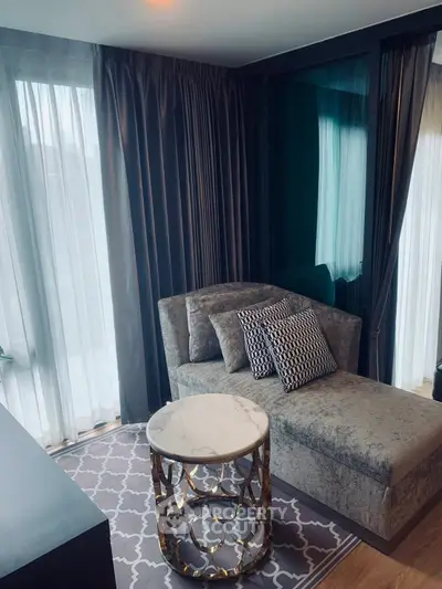Luxurious living room with elegant chaise lounge and stylish decor