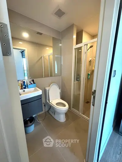 Modern bathroom with sleek design and glass shower enclosure