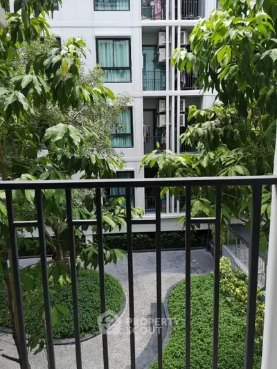 Charming garden view from a modern apartment balcony
