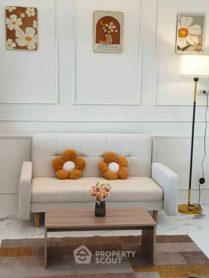 Charming living room with stylish decor and cozy seating area