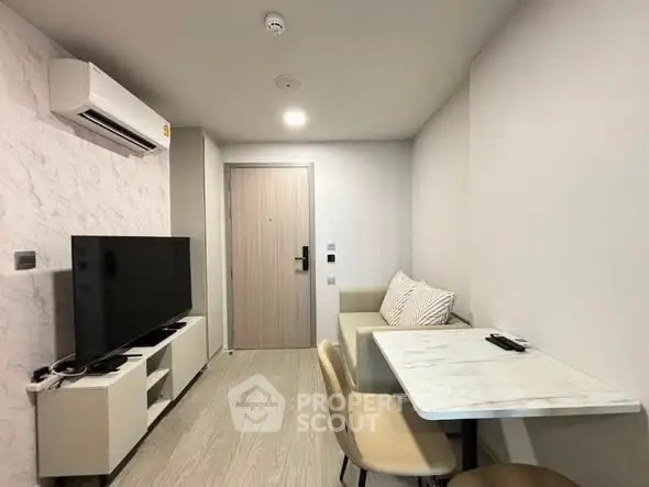 Modern living room with air conditioning and sleek furniture