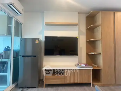 Modern living room with sleek TV setup and stylish wooden storage