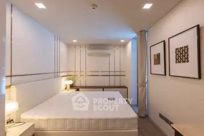 Modern minimalist bedroom with sleek design and ambient lighting