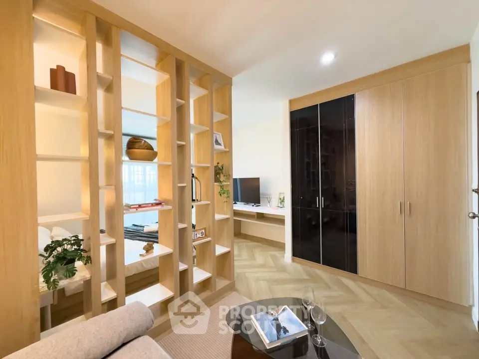 Modern living room with stylish wooden partition and sleek storage solutions