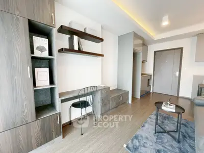 Modern living room with stylish shelving and cozy seating area