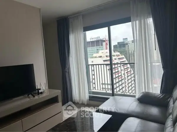 Modern living room with city view and sleek furniture