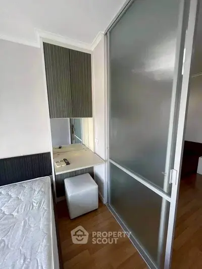 Modern bedroom with sliding door and stylish decor