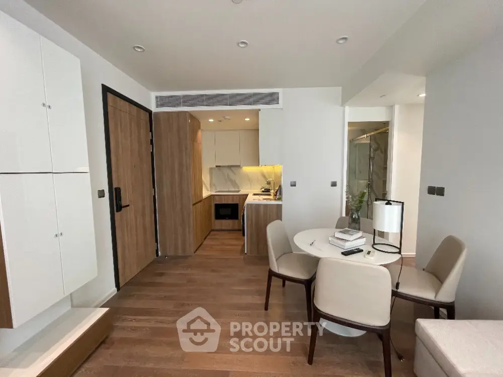 Modern open-plan living area with stylish kitchen and dining space
