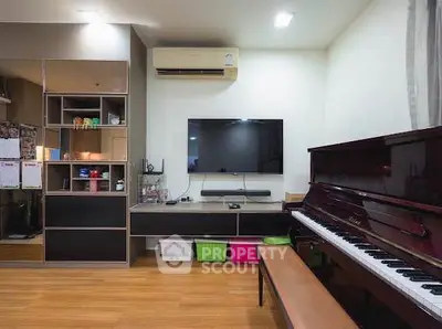 Modern living room with piano and wall-mounted TV, featuring stylish storage solutions.