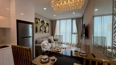 Luxurious modern living room with elegant chandelier and stylish decor