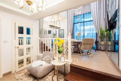 Luxurious living room with elegant decor and large windows in modern apartment