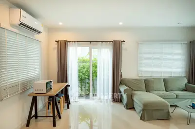 Bright and cozy living room with modern furniture and natural light