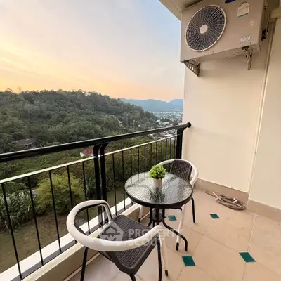 Charming balcony with scenic view, perfect for relaxation and enjoying sunsets.