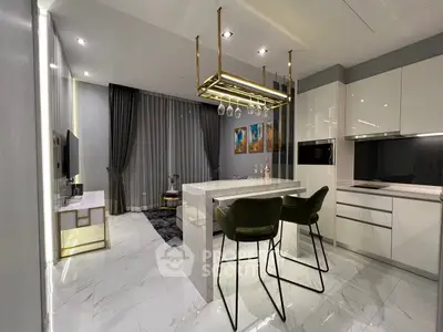 Luxurious modern kitchen with marble flooring and stylish bar seating in open layout apartment.