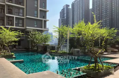 Luxurious urban apartment complex with serene pool and lush greenery, offering a tranquil oasis amidst city skyscrapers.