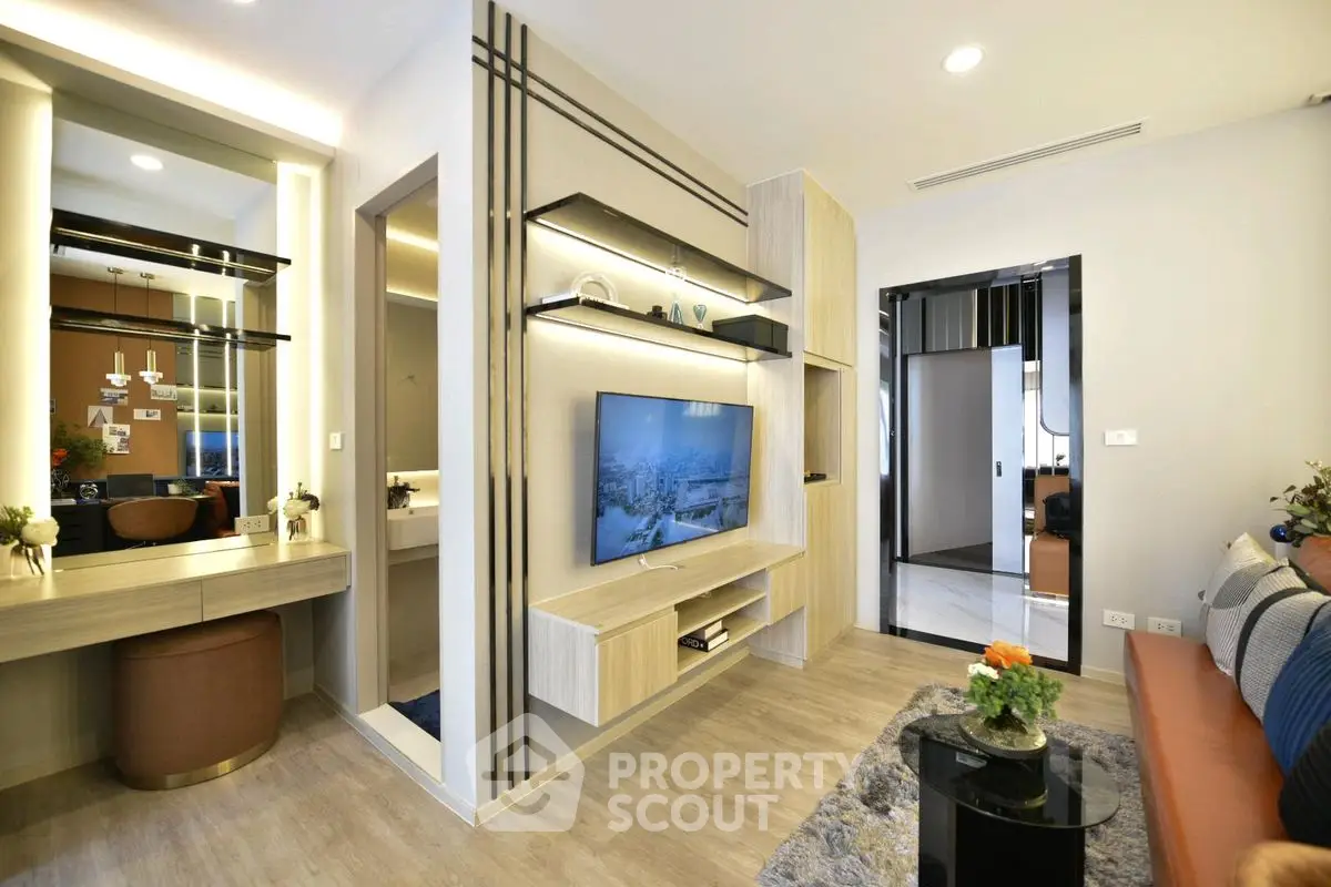 Modern living room with stylish decor and built-in TV unit