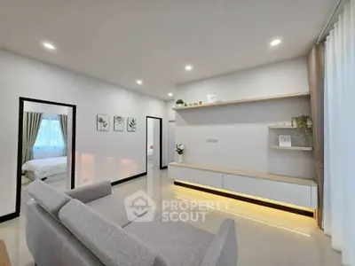 Modern living room with sleek furniture and ambient lighting