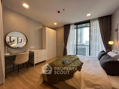 Modern bedroom with balcony view in high-rise apartment