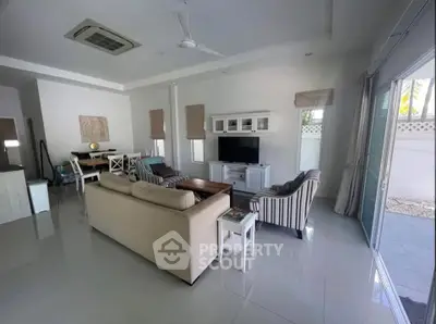 Spacious modern living room with stylish furniture and natural light