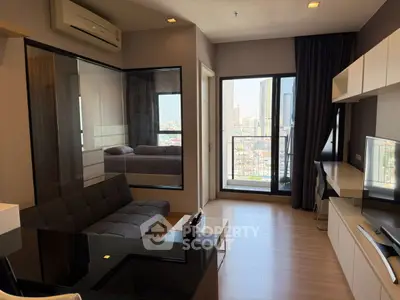 Modern living room with city view and sleek furnishings