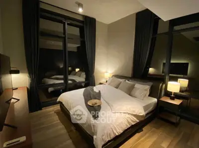 Luxurious modern bedroom with large windows and elegant decor