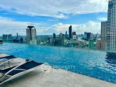 Stunning rooftop infinity pool with breathtaking city skyline view