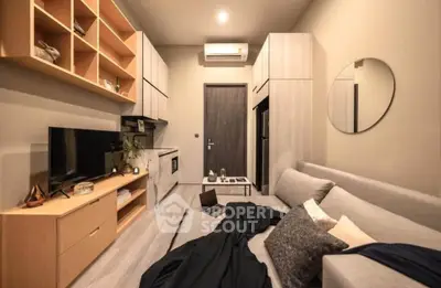 Modern living room with sleek furniture and stylish decor in a cozy apartment.