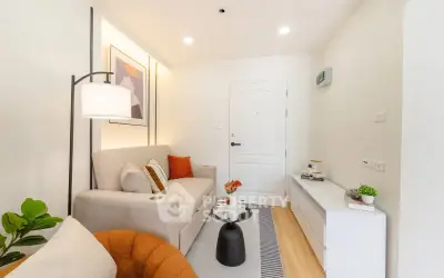 Chic modern living room with cozy sofa and stylish decor